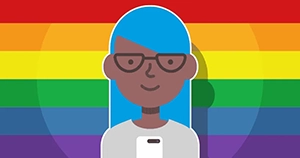 A teenager girl holding her smartphone in front of a rainbow flag